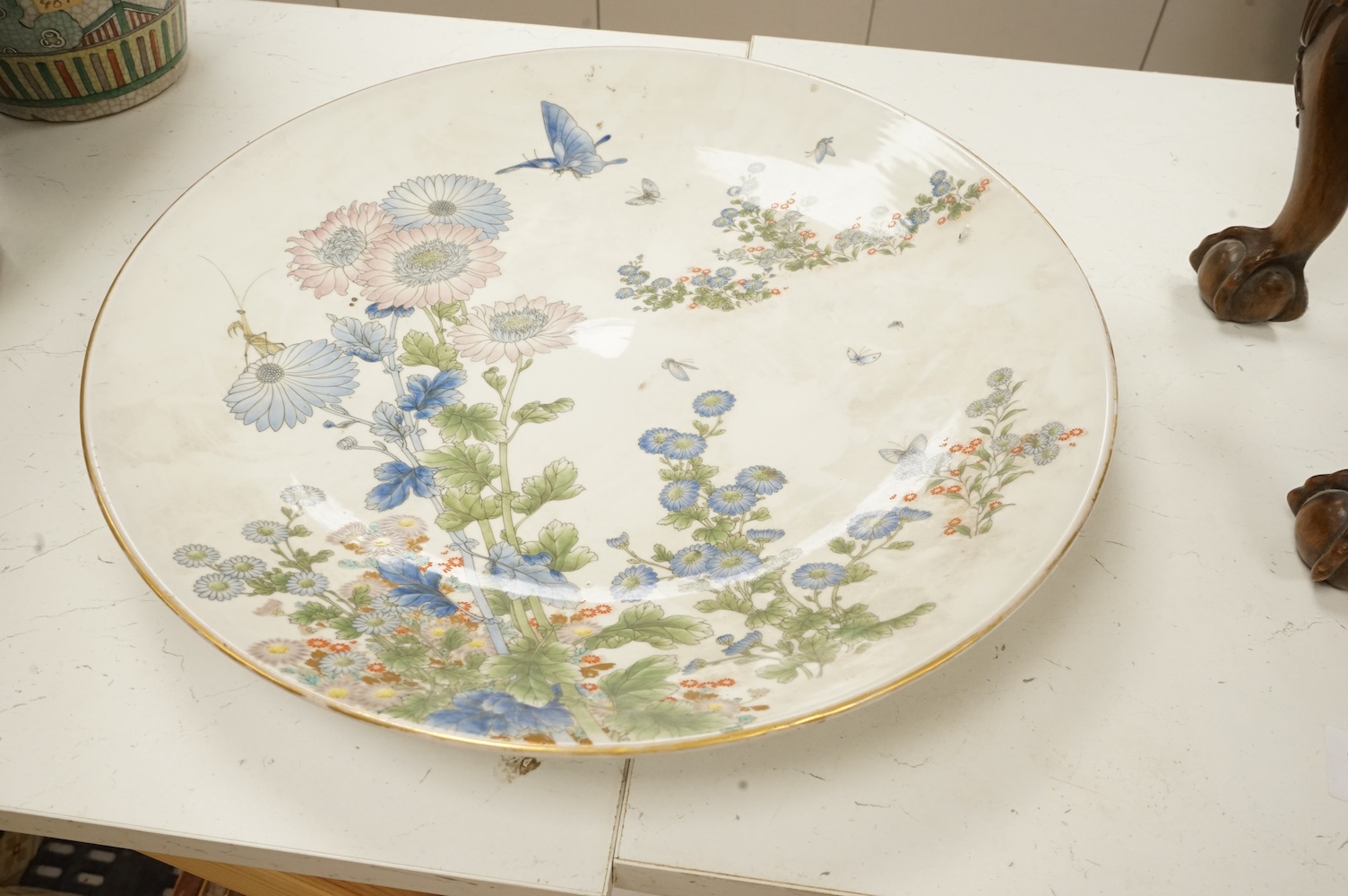 A large Japanese polychrome porcelain dish, by Fukagawa, 45cm diameter